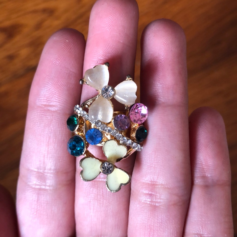 Yellow/cream colorful golden ring with diamonds